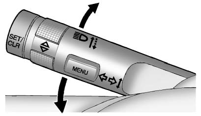 Move the lever all the way up or down to signal a turn.