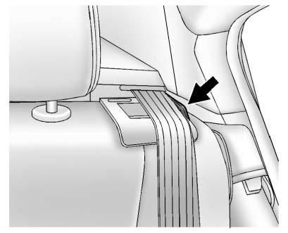 3. Make sure the safety belt is in the guide on top of the seatback.