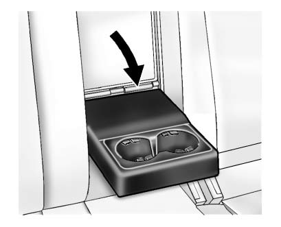 Cupholders may be located in the second row seat armrest. To access, pull the