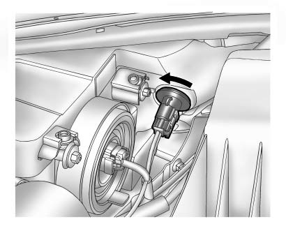 3. Remove the parking/turn signal lamp bulb socket from the headlamp assembly