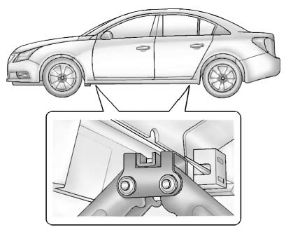 8. Position the jack lift head at the jack location nearest the flat tire.