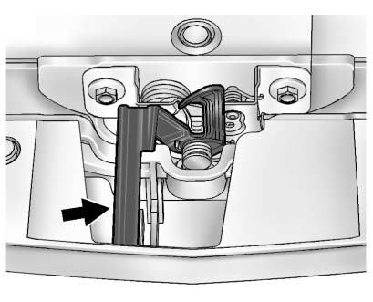 2. Go to the front of the vehicle and push the secondary hood release handle